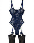 Navy Floral Lace Garter Bodysuit with Stockings, laid flat to show the full piece.