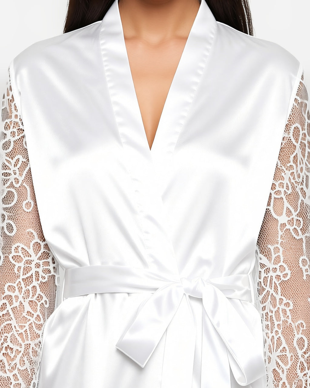 Satin Bride Robe with Embroidered Detail, detail close-up of the plain satin front, a sheer lace sleeve and the tied belt. onmodel