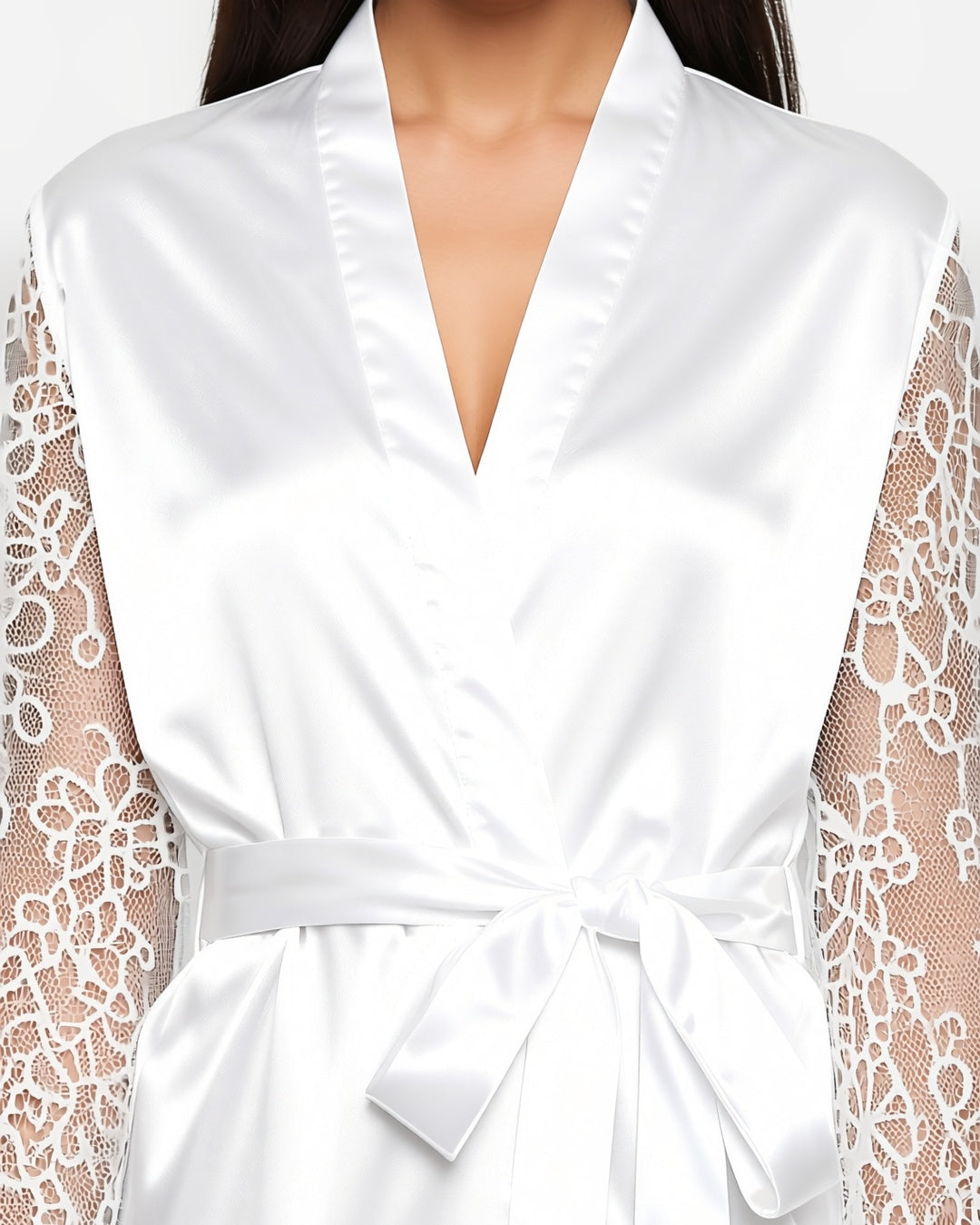 Satin Bride Robe with Embroidered Detail, detail close-up of the plain satin front, a sheer lace sleeve and the tied belt. onmodel