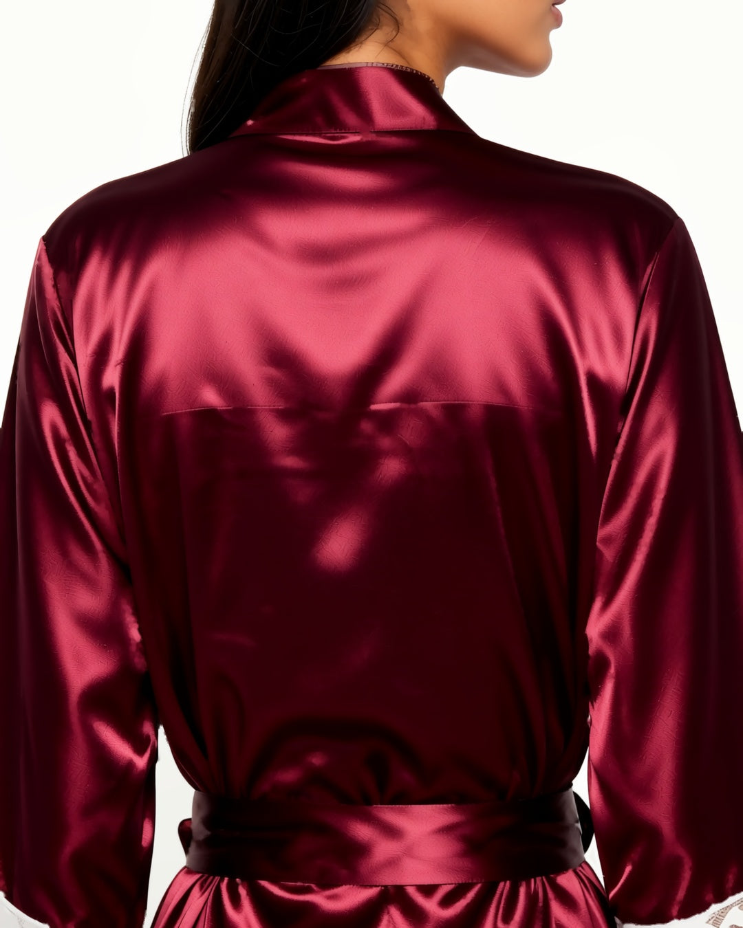 Satin Bridal Robe with Lace Trim, detail close-up of the back of the closed robe and its tied belt. onmodel