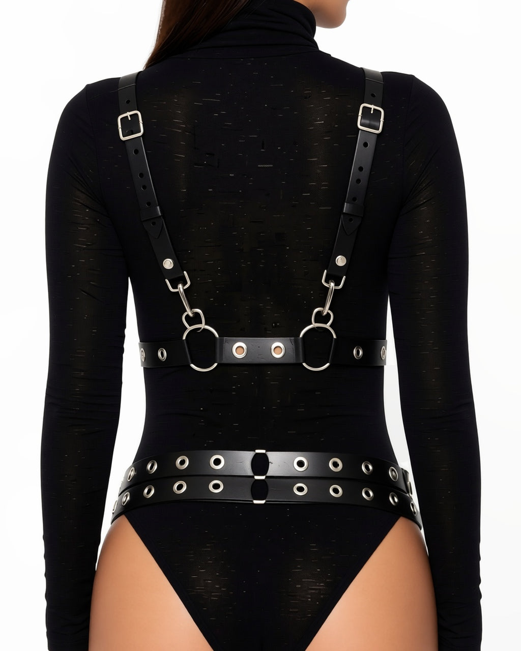 Multi-Layer Faux Leather Waist Cinch with Rivet Rings, detail close-up of the back of the harness: the straps and buckles across the back. The black bodysuit is styling only and not included. onmodel
