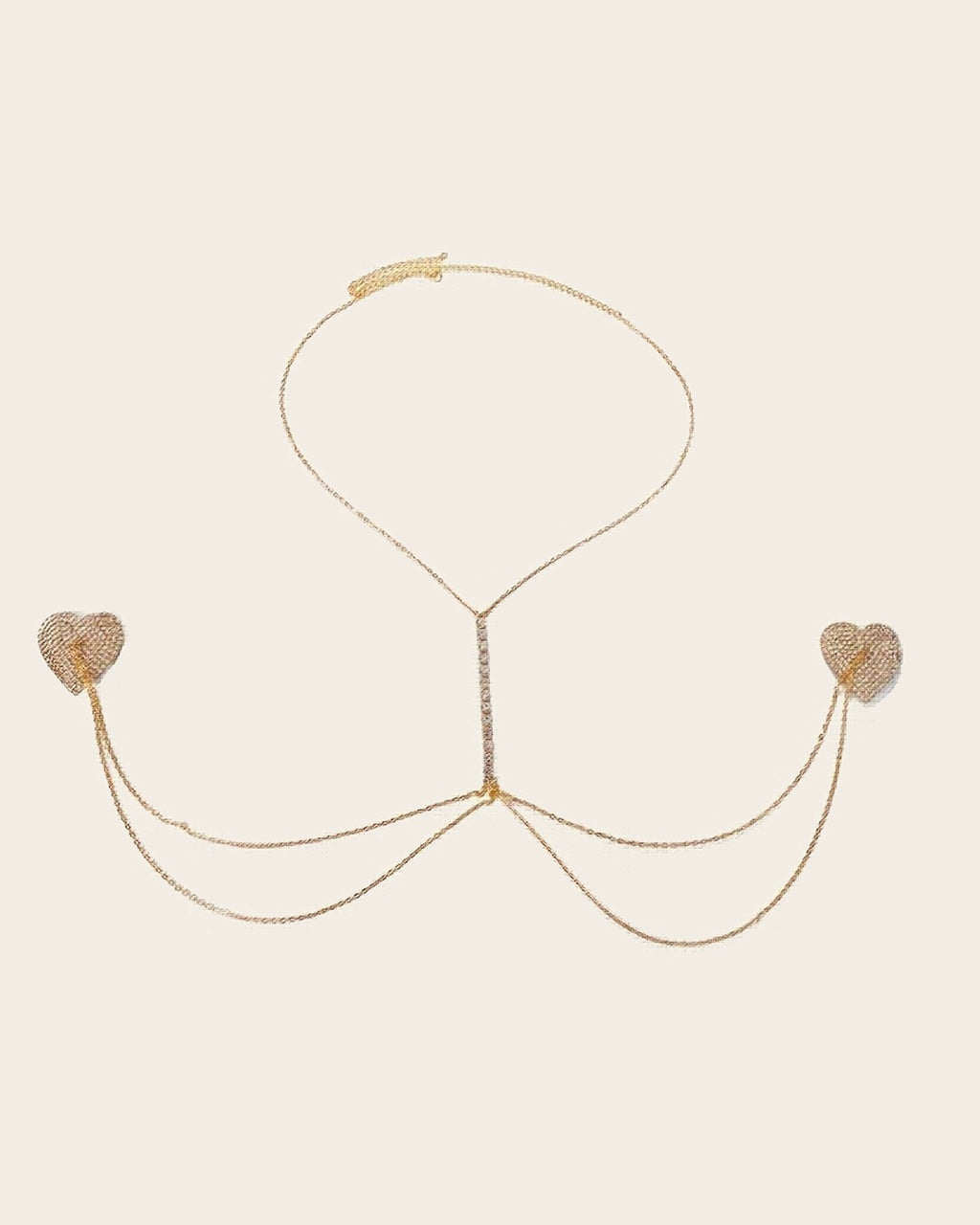 Rhinestone Heart Body Chain in Gold laid flat to show the full piece.