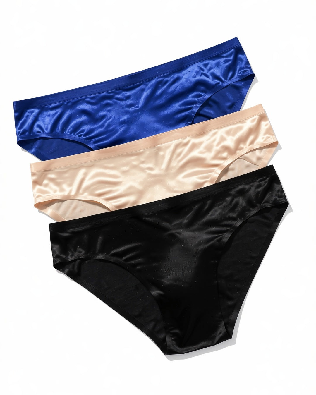 Men's Seamless Low-Rise Briefs, 3-Pack in Blue, Skin, Black, laid flat to show the full piece.
