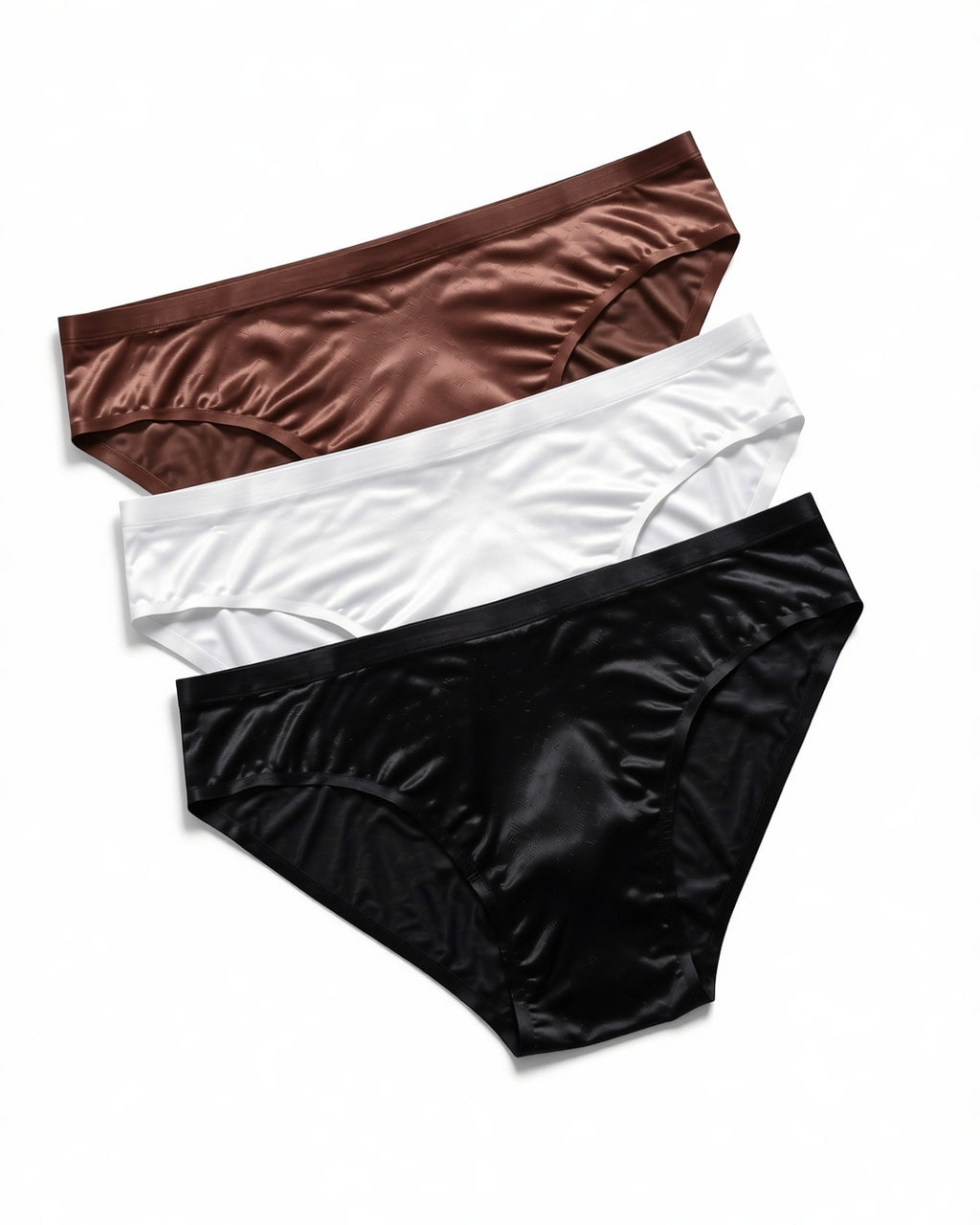 Men's Seamless Low-Rise Briefs, 3-Pack in Coffee, White, Black, laid flat to show the full piece.