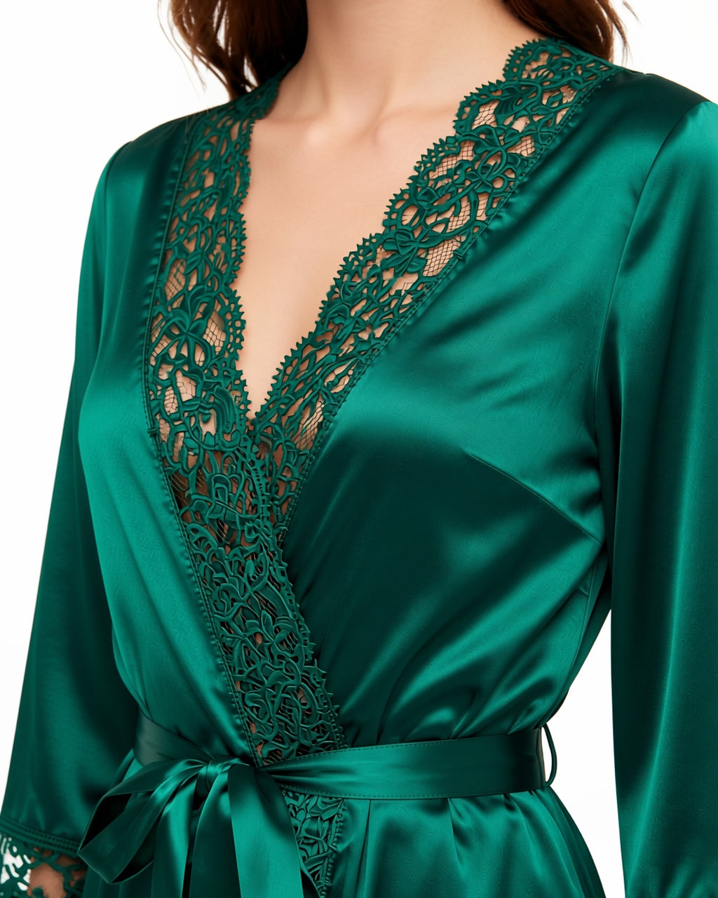 Lace Trim Satin Wrap Robe in Malachite Green, detail close-up of the satin and lace trim of the robe at the neckline, the sleeve and the tied belt. onmodel