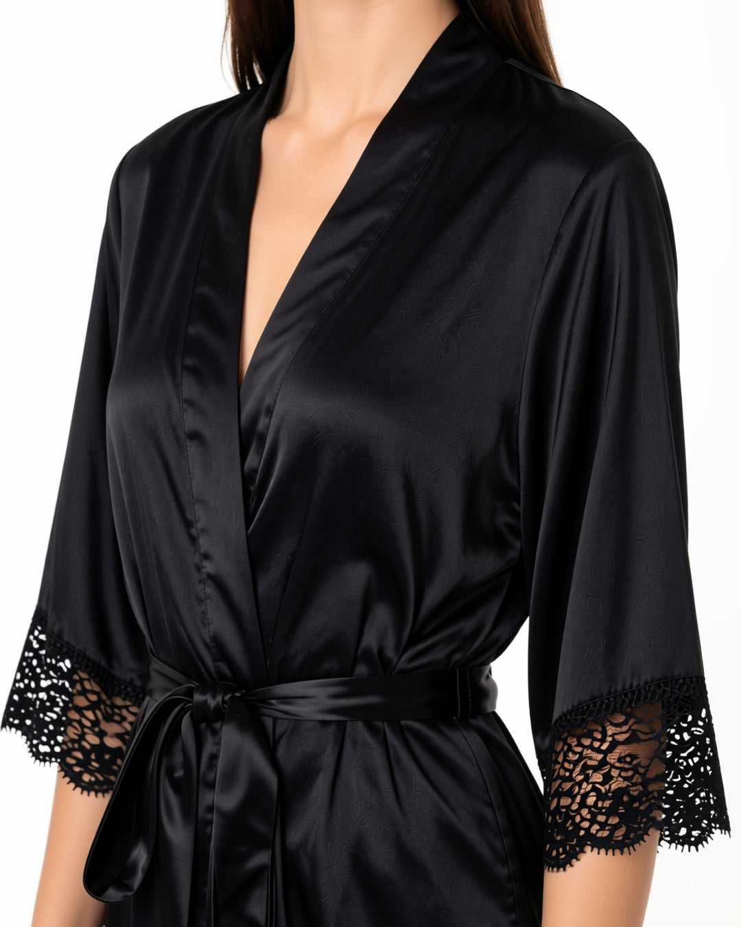 Belted Robe with Contrast Lace Trim, detail close-up of the satin and lace trim of the robe at the neckline, the sleeve and the tied belt. onmodel