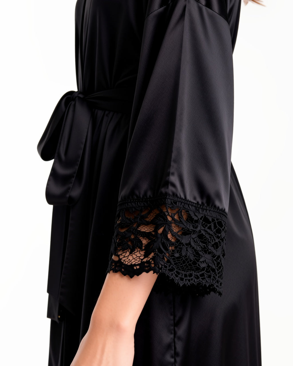 Long Satin Robe with Contrast Lace, detail close-up of the satin and lace trim of the robe at the neckline, the sleeve and the tied belt. onmodel