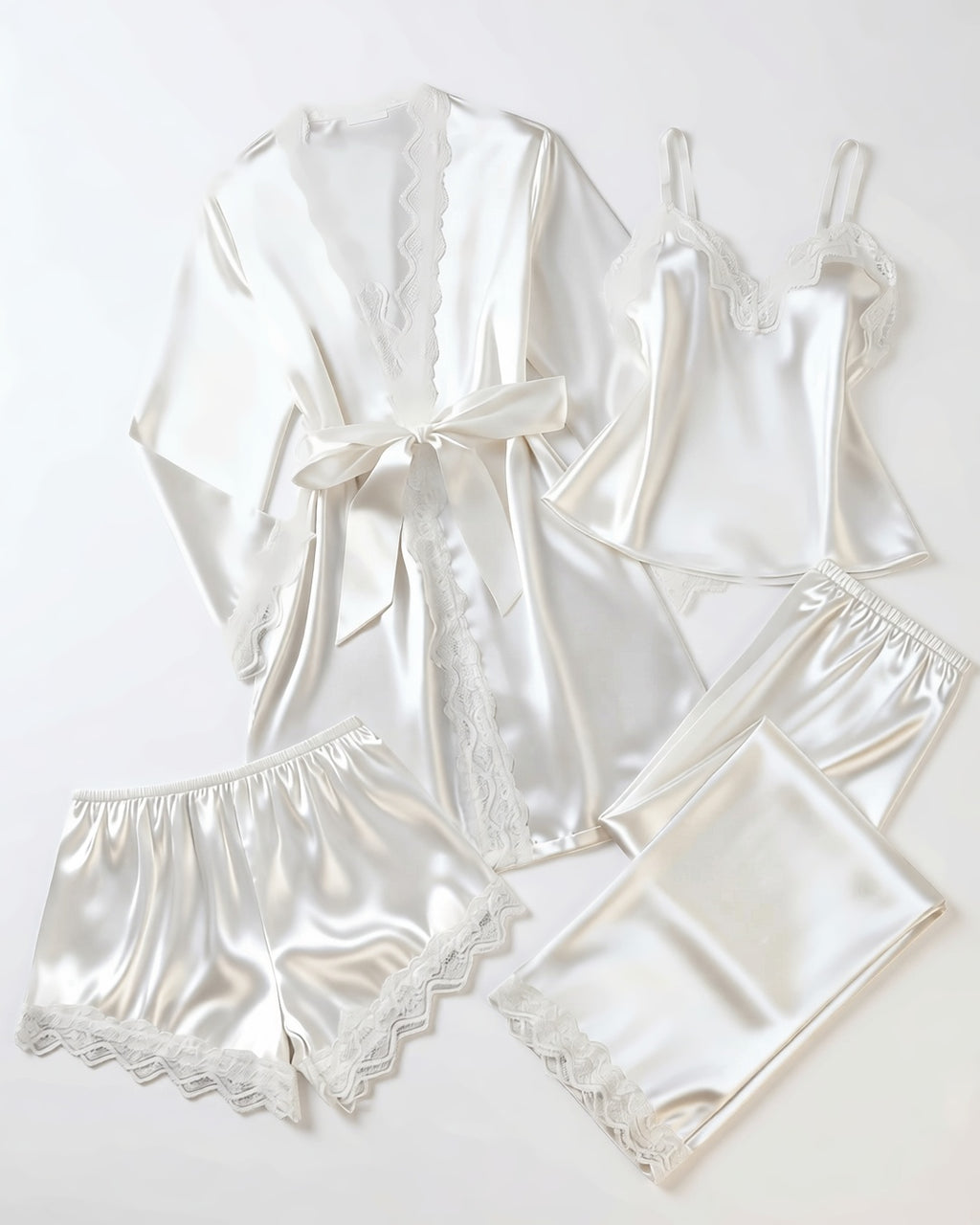 Four-Piece Satin Lace Pajama Set in White, laid flat to show the full piece.
