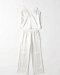 Satin Cami and Trousers Pyjama Set with Eyelash Lace in White, laid flat to show the full piece.