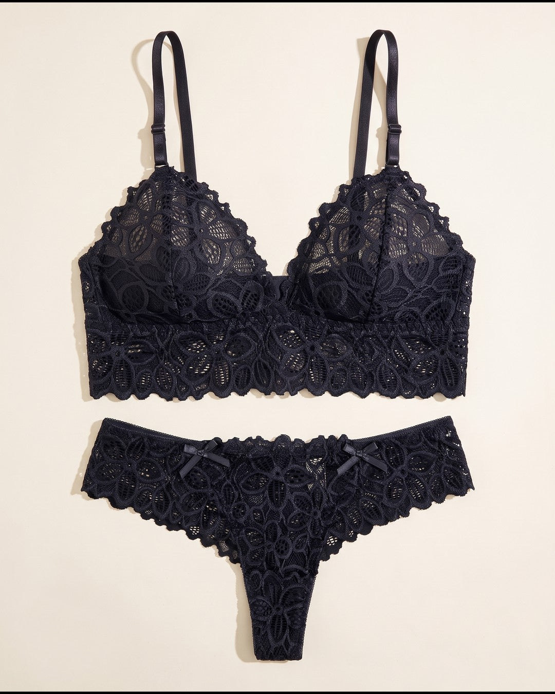 Scalloped Lace Bralette and Thong Set in Black, laid flat to show the full piece.