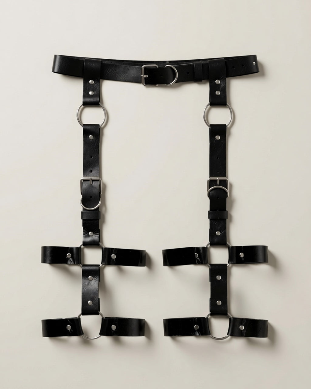 Faux Leather Thigh Harness Cage, laid flat to show the full piece.