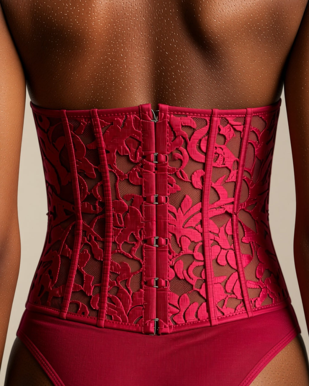Halter Lace Bodysuit, detail close-up of the open back of the bodysuit and its lace.