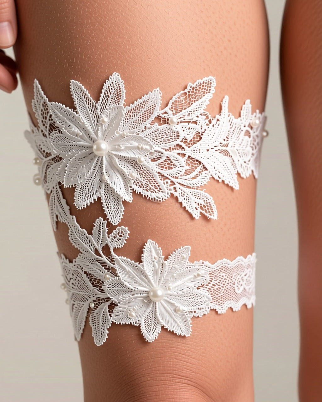 Lace Flower Thigh Garter with Pearls, detail close-up of the lace flower thigh garter with its small pearl beads.