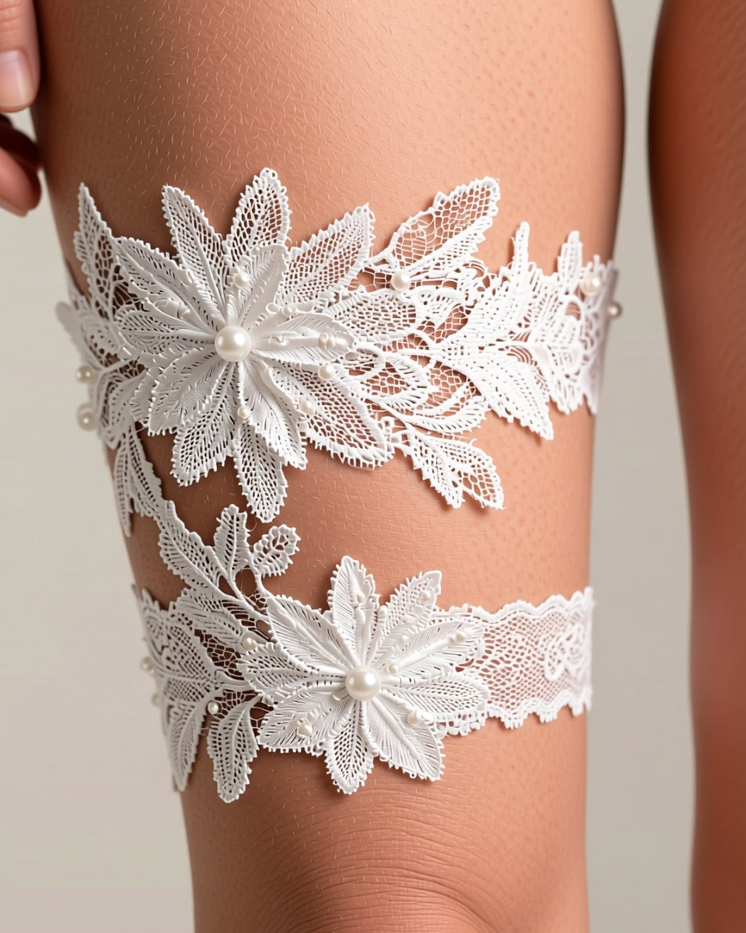 Lace Flower Thigh Garter with Pearls, detail close-up of the lace flower thigh garter with its small pearl beads.