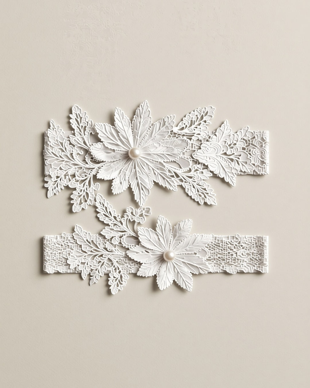 Lace Flower Thigh Garter with Pearls, laid flat to show the full piece.