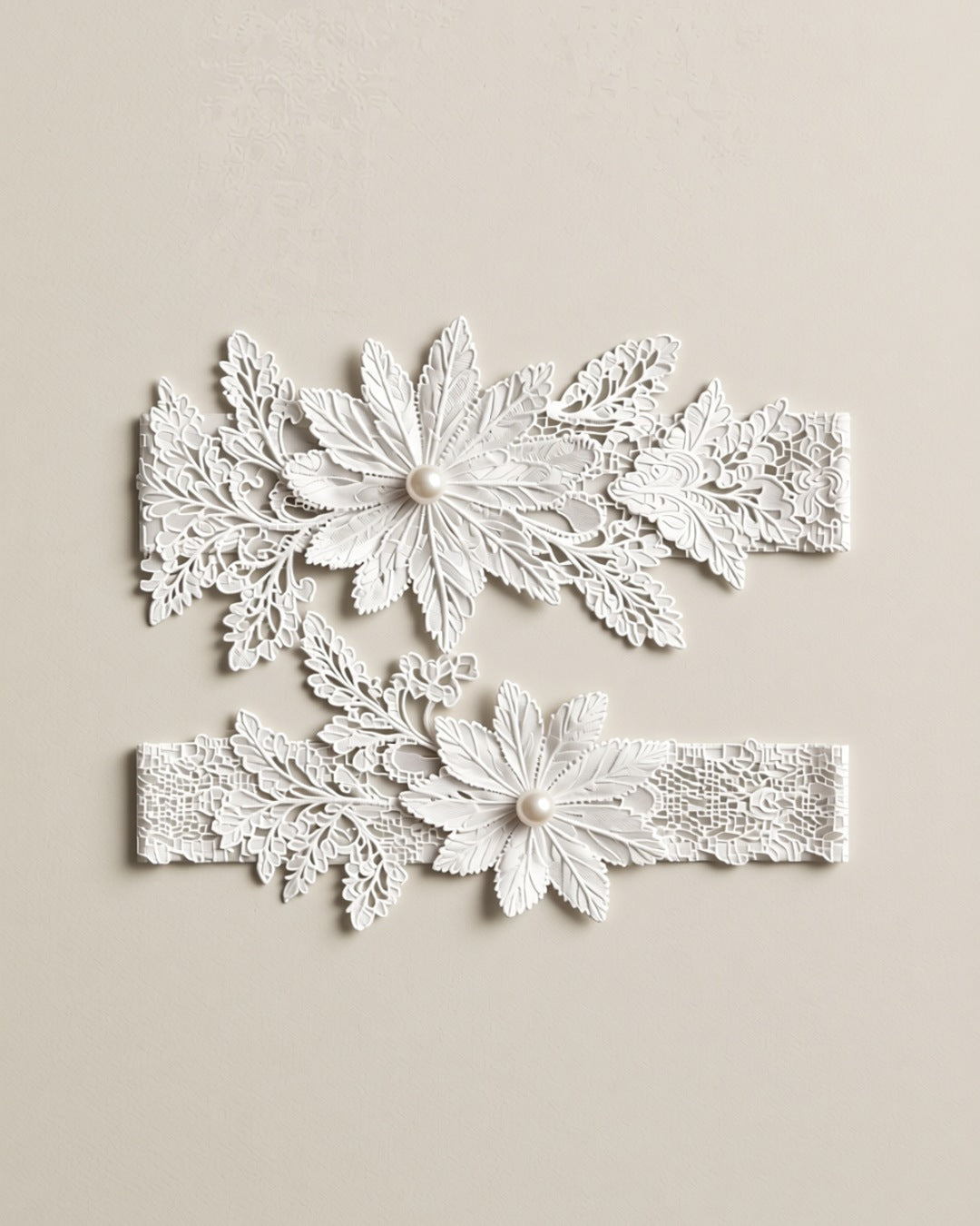 Lace Flower Thigh Garter with Pearls, laid flat to show the full piece.