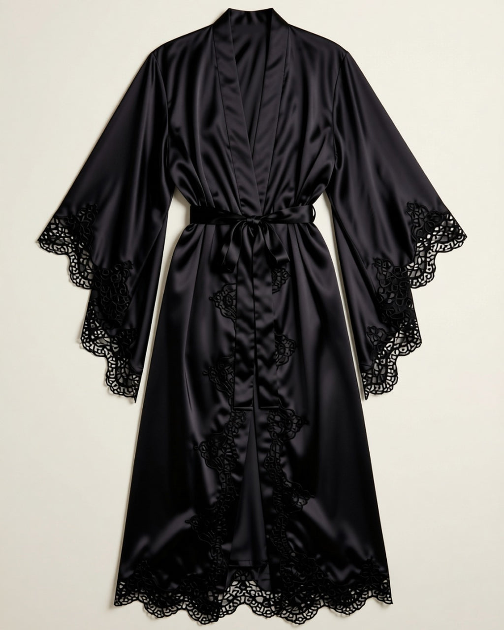 Long Satin Kimono Robe with Lace Trim in black, laid flat to show the wide lace-trimmed sleeves and tie belt.
