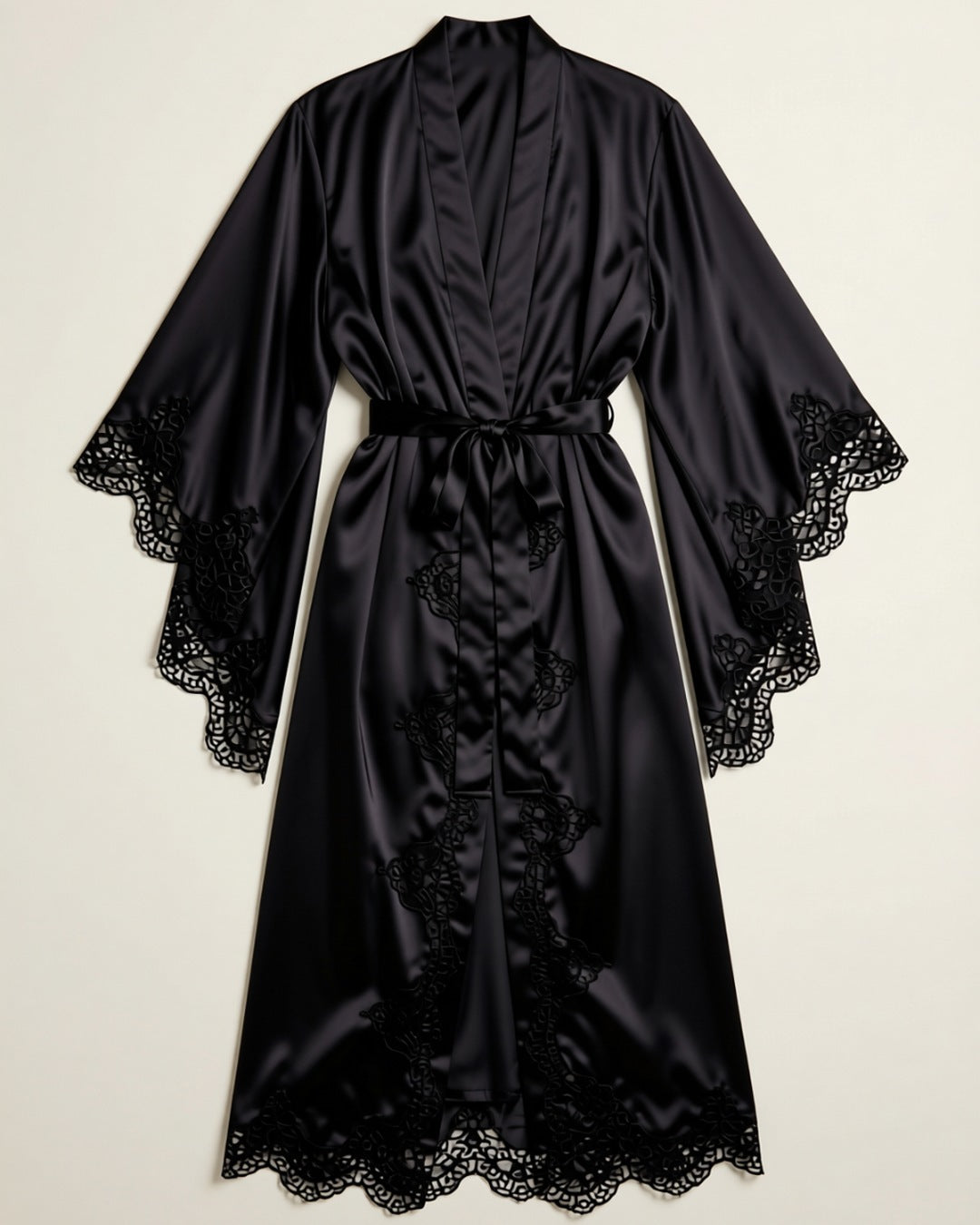 Long Satin Kimono Robe with Lace Trim in black, laid flat to show the wide lace-trimmed sleeves and tie belt.