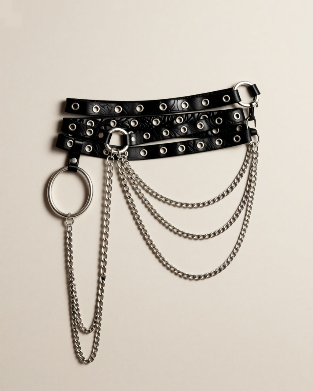 Multi-Layer Faux Leather Waist-to-Leg Harness with Chain, laid flat to show the full piece.